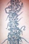 Bio mechanical spine tattoo