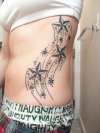 Shooting Stars up ribs tattoo