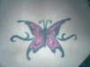 my lower back also a cover up tattoo