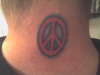 T's  Peace sign tattoo