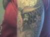 1st sittin on koi tattoo