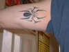 spider under arm tattoo