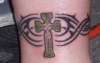 Celtic Cross with Tribal tattoo