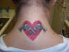 heart w/guns tattoo
