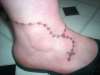 rosery beads tattoo