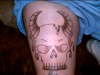 skulls and flames tattoo