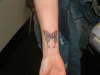 stone butterfly tattoo