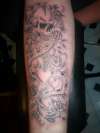 Skull Snake Roses tattoo