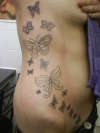 butterfly side tattoo