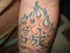 Kanji with flames tattoo