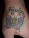 Freedom butterfly tattoo