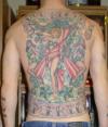 traditional back piece tattoo
