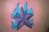 nautical star with blue flames. tattoo