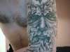 Green man tattoo