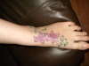 lillies on the foot tattoo