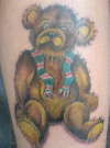 teddybear wearing a rangers scarf tattoo