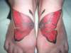 Butterfly feet tattoo
