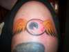 Von Dutch flying eyeball tattoo