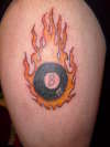 Flaming 8-ball tattoo