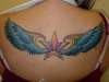 Winged Star with Sun tattoo
