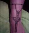 cross and chain tattoo
