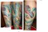 bio mech leg piece tattoo