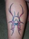 Lower leg tribal tattoo