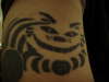 Tribal Cheshire Cat tattoo