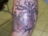 tree on leg tattoo