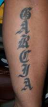 our last name tattoo