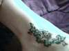 Ladybug w/Shamrocks tattoo