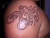Script that spells AJH tattoo