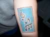Musical box tattoo