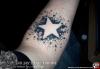 grungy star tattoo