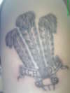 three feathers tattoo