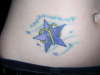 Star w/ Aries symbol tattoo