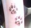 leopard print paw prints tattoo