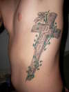 Cross on Left Side tattoo