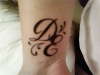 Daughters initials tattoo