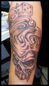 smokey skull tattoo