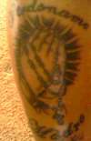 Gods Hands Sayin forgive me mother in spanish tattoo