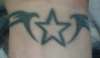 wrist star tattoo