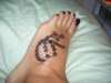 Cross on my foot tattoo