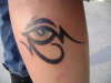 Tribal eye tattoo