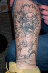 leg monster tattoo