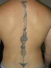 spine piece tattoo