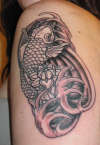 Koi Upper Arm: The Beginning of the Journey tattoo