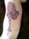praying hands stone tattoo