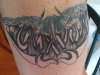 Tribal and sons name tattoo