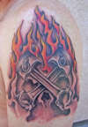 crossed pistons/smoke/flames/skull tattoo